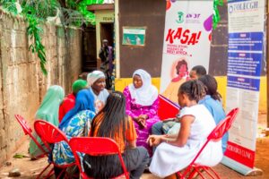 A group of women in circle having a group discussion. 